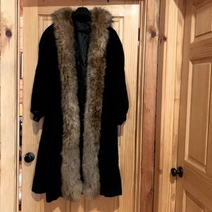 Beautiful statement piece coat real fur on collar and all the way down.